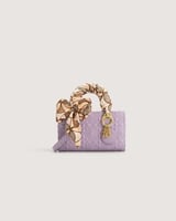 شنطة للبنات لكل يوم بلون أرجواني.