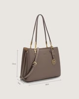 ‎ شنطة نسائية أنيقة بلون بيج