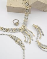 طقم نسائي زركون فاخر بلون فضي وذهبي