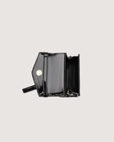 شنطة أطفال ميني من الجلد بلون أسود.