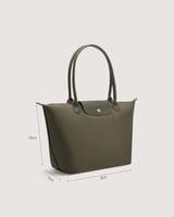 شنطة نسائية بمقاس كبير بلون أخضر