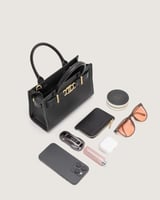 شنطة برق النسائية جلد بلون أسود