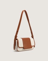 شنطة حِرفة النسائية لكل يوم بلون أبيض وبني.