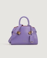 شنطة تَميٌز بلون أرجواني بحجم متوسط لكل يوم.