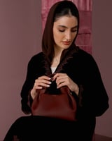 شنطة أمجاد النسائية جلد باللون العودي