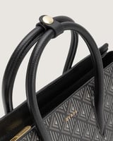 شنطة ورد النسائية جلد بلون أسود