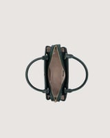 شنطة نسائية بتصميم أنيق بلون أخضر