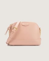 شنطة نسائية بتصميم أنيق بلون وردي