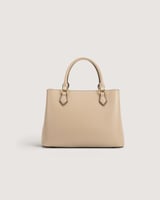 شنطة نسائية كبيرة بلون بيج.