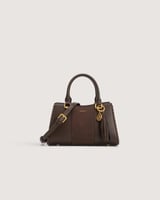 شنطة نسائية من الجلد بلون بني