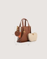 شنطة نسائية بلون بني بمقاس صغير لكل يوم