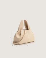 شنطة أمجاد النسائية جلد باللون البيج