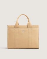 شنطة نسائية بحجم واسع بلون بيج