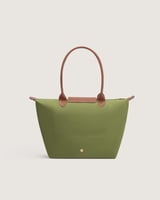 ‎ شنطة نسائية بمقاس كبير بلون أخضر و بني