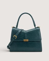 شنطة نسائية متوسطة الحجم بلون أخضر