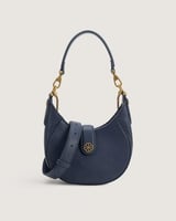 شنطة نسائية بلون أزرق وبمقاس صغير.