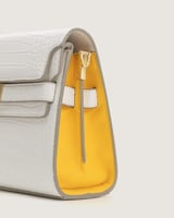 شنطة لمار النسائية بلون أبيض وأصفر