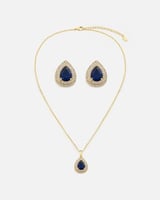 طقم نسائي فاخر بلون ذهبي