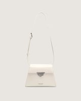 ‎ شنطة نسائية بتصميم عصري بلون بيج.