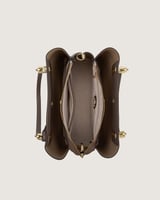 ‎ شنطة نسائية أنيقة بلون بيج