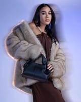 شنطة أمجاد النسائية جلد باللون الأسود