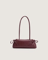 شنطة تعزز هويتك باللون العودي