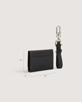 محفظة نسائية و ميدالية جلد بلون أسود