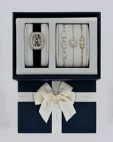 طقم نسائي أساور وساعة جلد بلون أسود