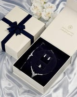 طقم نسائي فاخر باللون الفضي