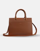شنطة نسائية بحجم متوسط من الجلد بلون بني