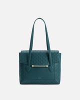 شنطة نسائية مميزة من الجلد بلون أزرق