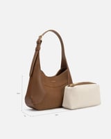 شنطة نسائية تناسب كل يوم بلون بني