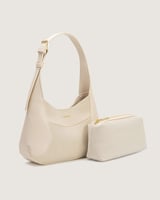 شنطة نسائية تناسب كل يوم بلون أبيض