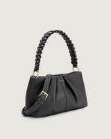 شنطة نسائية بلون أسود تناسب اطلالتك في كل الأوقات