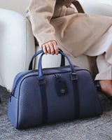 شنطة للجنسين بتصميم عملي بلون أزرق