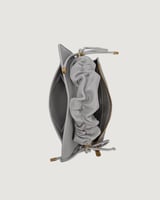 شنطة نسائية بتصميم مميز بلون رمادي