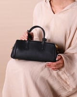 شنطة صفاء النسائية جلد بلون أسود