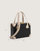 شنطة ياقوت النسائية من الجلد بلون أسود وبيج.