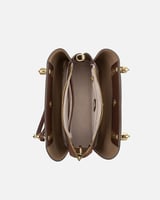 ‎ شنطة نسائية أنيقة بلون بني