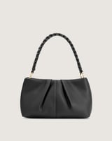 شنطة نسائية بلون أسود تناسب اطلالتك في كل الأوقات