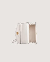 شنطة أطفال ميني جلد بلون أبيض.