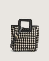 شنطة نسائية بلون أسود و أبيض لكل يوم بتصميم عصري