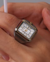 ساعة الخاتم بتصميم مبتكر بلون ذهبي وفضي