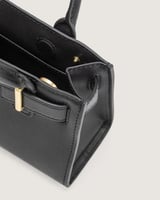 شنطة برق النسائية جلد بلون أسود