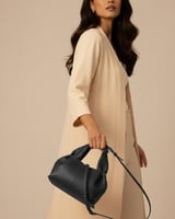 شنطة أمجاد النسائية جلد باللون الأسود