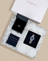 طقم نسائي فضي من ساعة وخاتم واسوارة