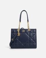 ‎ شنطة نسائية من الجلد باللون الأزرق