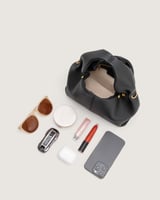 شنطة أمجاد النسائية جلد باللون الأسود