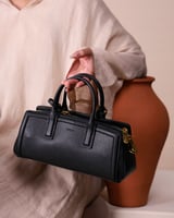 شنطة صفاء النسائية جلد بلون أسود