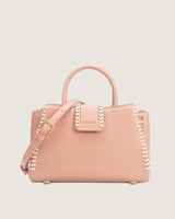شنطة نسائية متوسطة الحجم بلون وردي